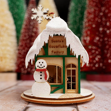 Santas Snowflake Factory Ornament